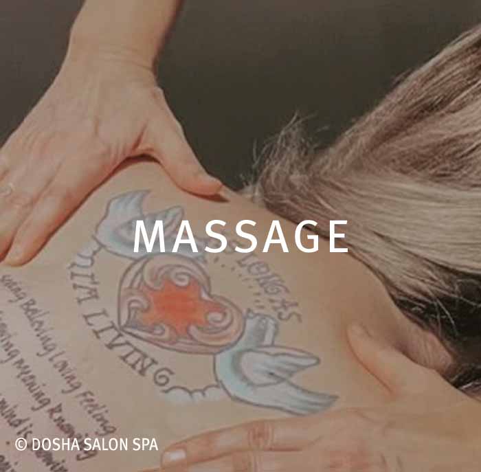 A Dosha guest receiving a deep tissue massage