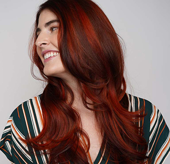 Fashion hair color service at Dosha Salon Spa featuring bold, customized shades.