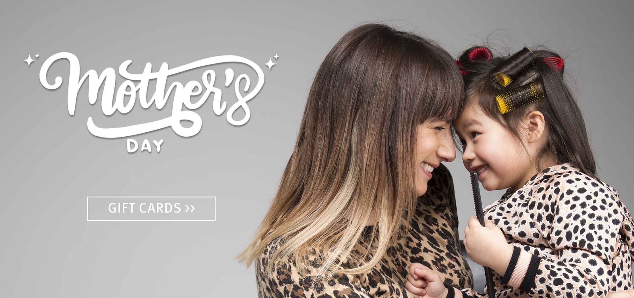 Image of Master Stylist Doza Barcelona with her child on mother's day