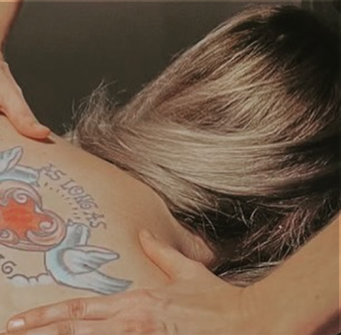 A Dosha guest receiving a deep tissue massage