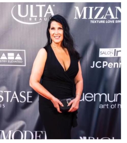 ​​​​Image of master stylist kim botner on the NAHA red carpet
