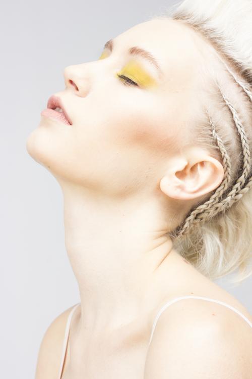 Hair and Makeup by Dosha Creative Team mohawk fohawk blonde white ash edgy braids cornrows yellow hair makeup
