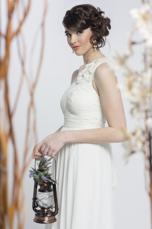 bride bridal wedding white brunette curls updo bangs lantern flowers