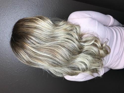 This platinum blonde cool colored hair is silky smooth.