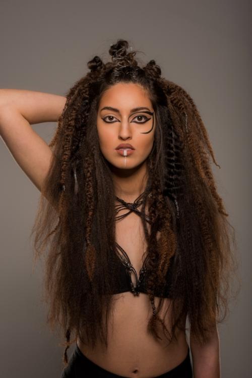 warrior tribal hair makeup editorial updo makeup strong bold