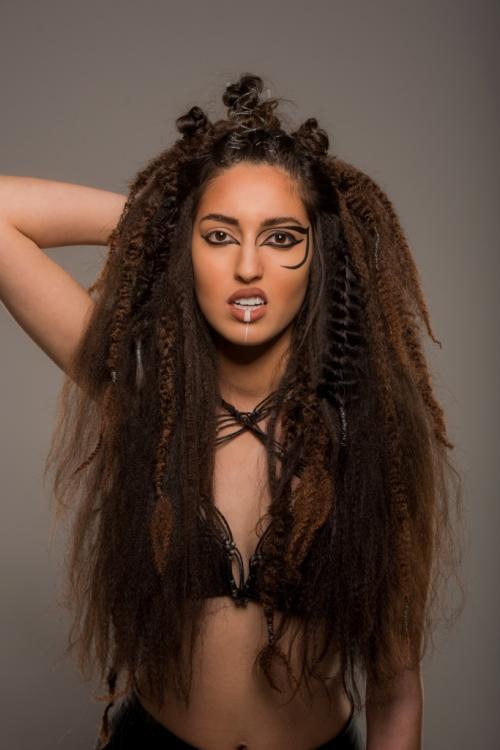 warrior tribal hair makeup editorial updo makeup strong bold