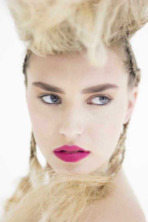 updo blonde mohawk fauxhawk braid cornrow pink lipstick tangled messy