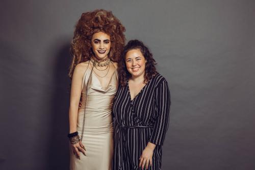 Evening 4 Earth 2019 Photoshoot of model in circus inspired lion hairstyle and makeup in tan dress and jewelry with stylist
