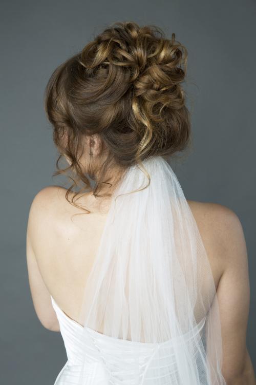 bridal updo veil curls bangs brunette wedding bride