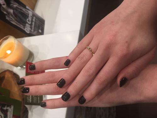 Black nails with Gold rings Dosha Salon Spa