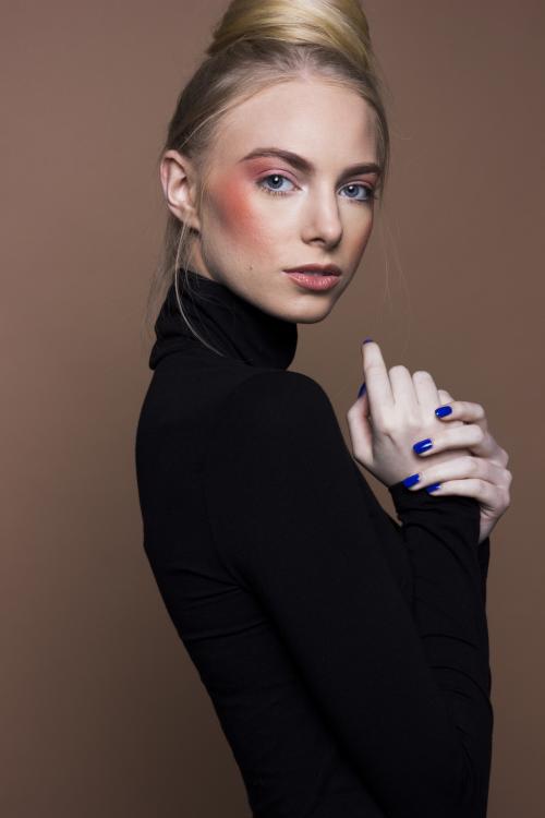 by Dosha Creative Team blonde bun updo orange coral red highlight contour blend makeup dramatic