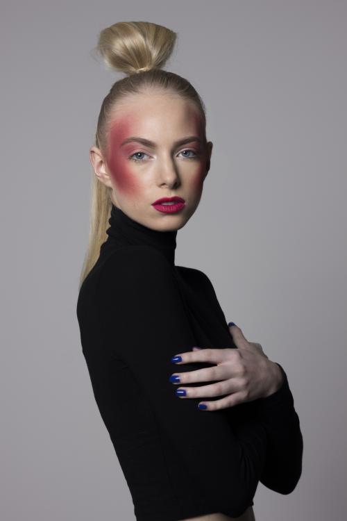 by Dosha Creative Team blonde bun updo orange coral red highlight contour blend makeup dramatic